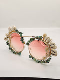 Africa in Me embellished eyeglass displayed on a white surface