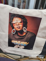 Lauryn Hill wearing Fugees shirt on Off-White Canvas