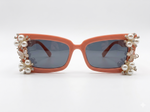 Pearls are Necessary Sunglasses with arms open viewed from the front